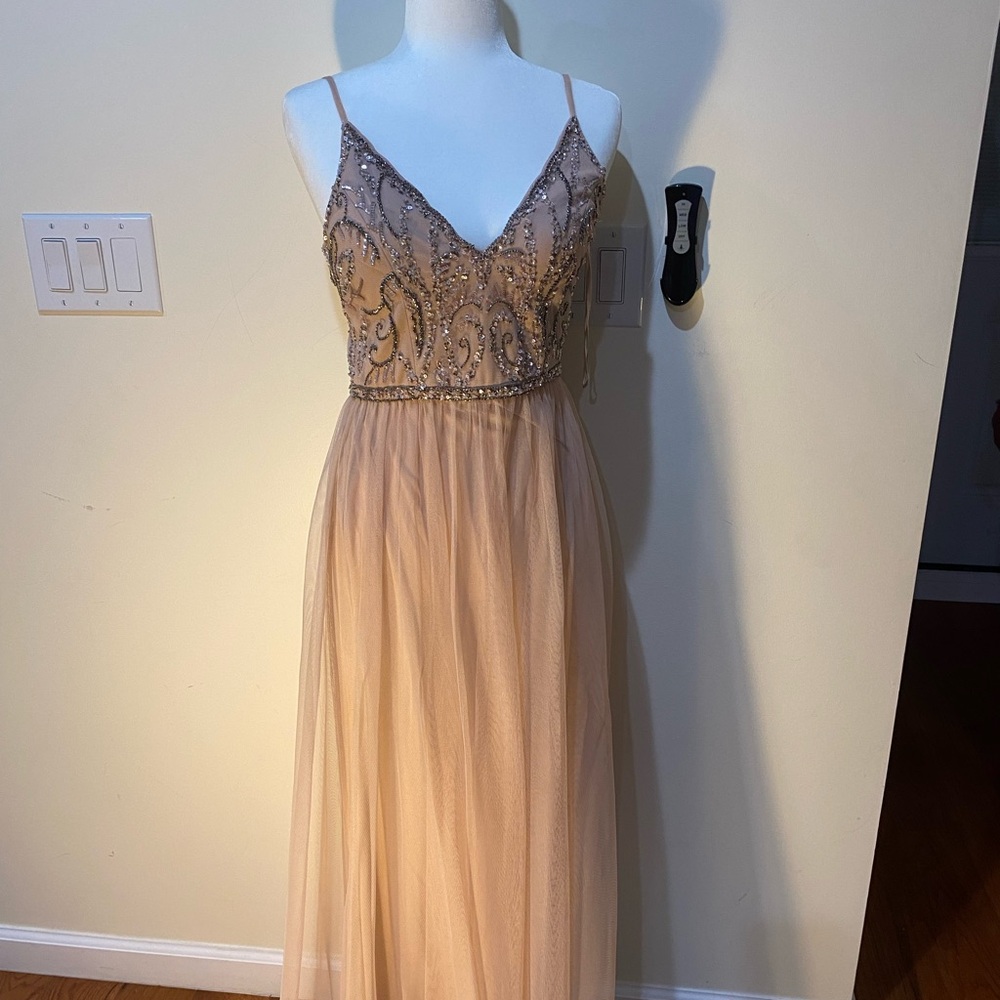 Elegant Beige Beaded Evening Gown